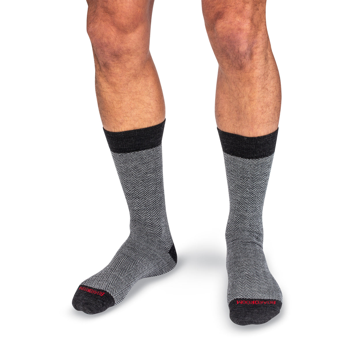 model wearing pair of grey herringbone merino wool dress socks