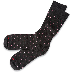 dark charcoal grey wool dress socks decorated with bright pink polka dots