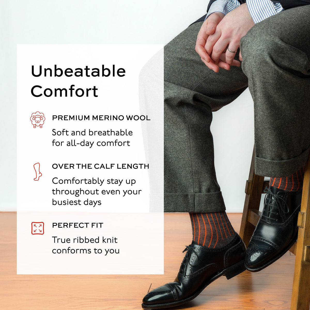 image of man seated on stool wearing grey and orange shadow stripe dress socks with overlay text about comfort