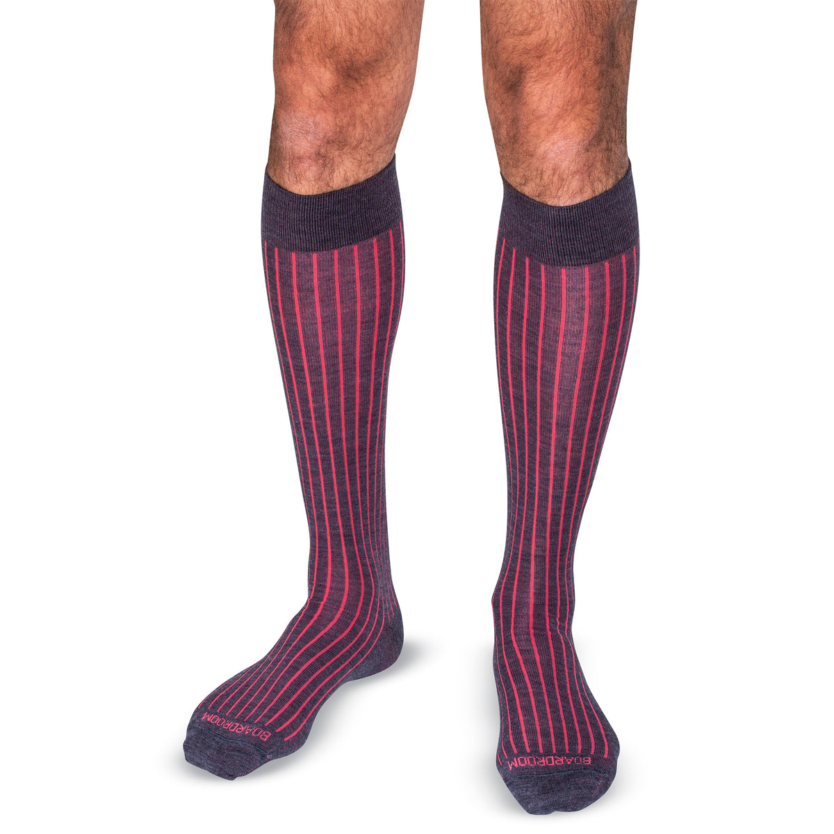 model wearing coral and denim over the calf length shadow stripe dress socks