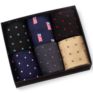 opened gift box filled with six pairs of colorful patterned cotton dress socks