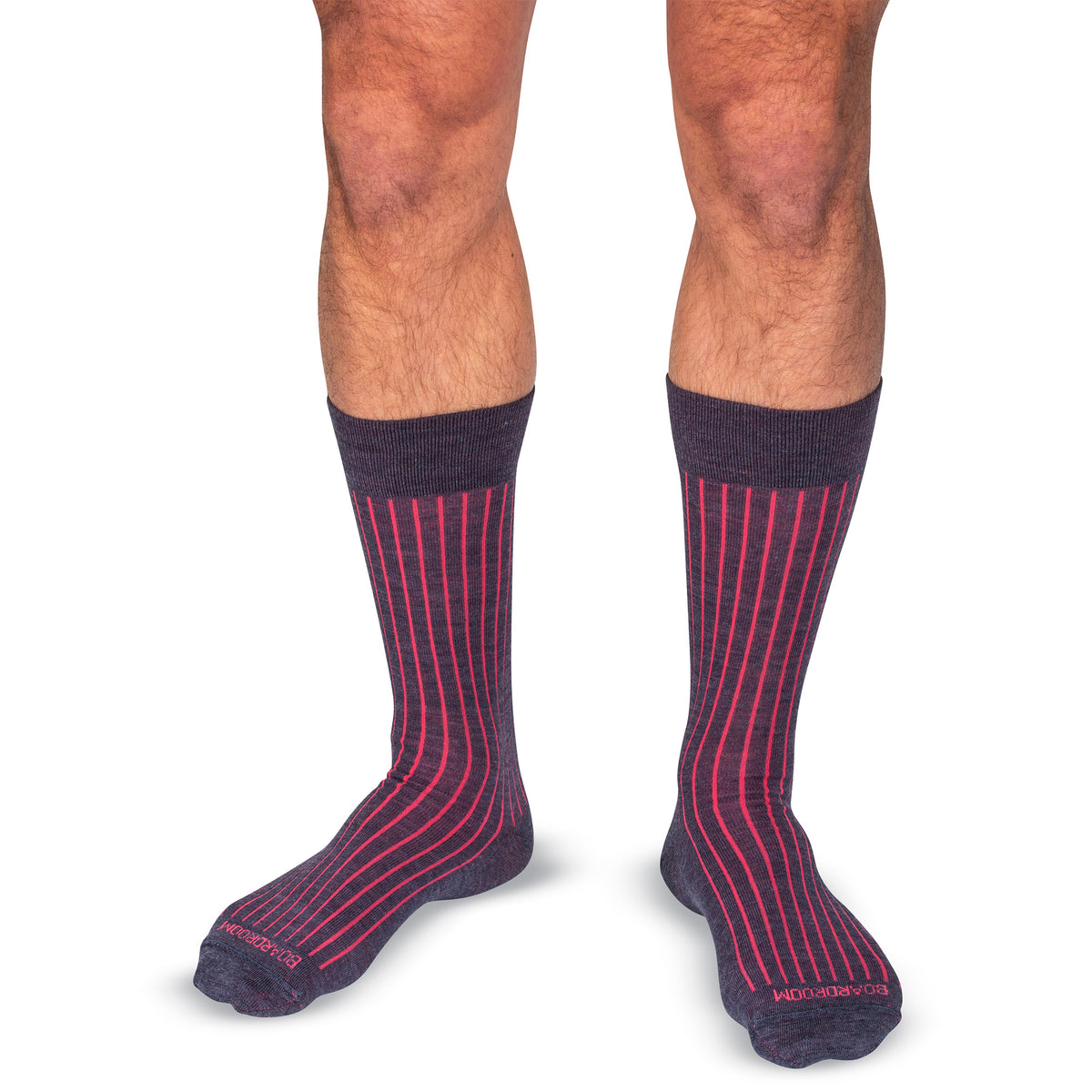 model wearing mid-calf length denim and coral shadow stripe dress socks