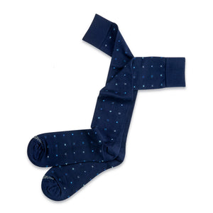 navy over the calf cotton dress socks with geometric pattern laying flat on a white background