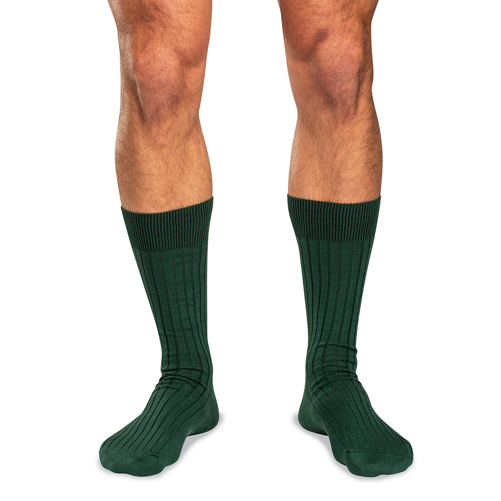 model wearing forest green dress socks