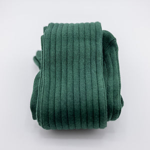 folded forest green ribbed dress socks