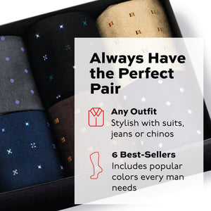 box of cotton pattern dress socks rolled up and tucked neatly in a black box on a white background with 
