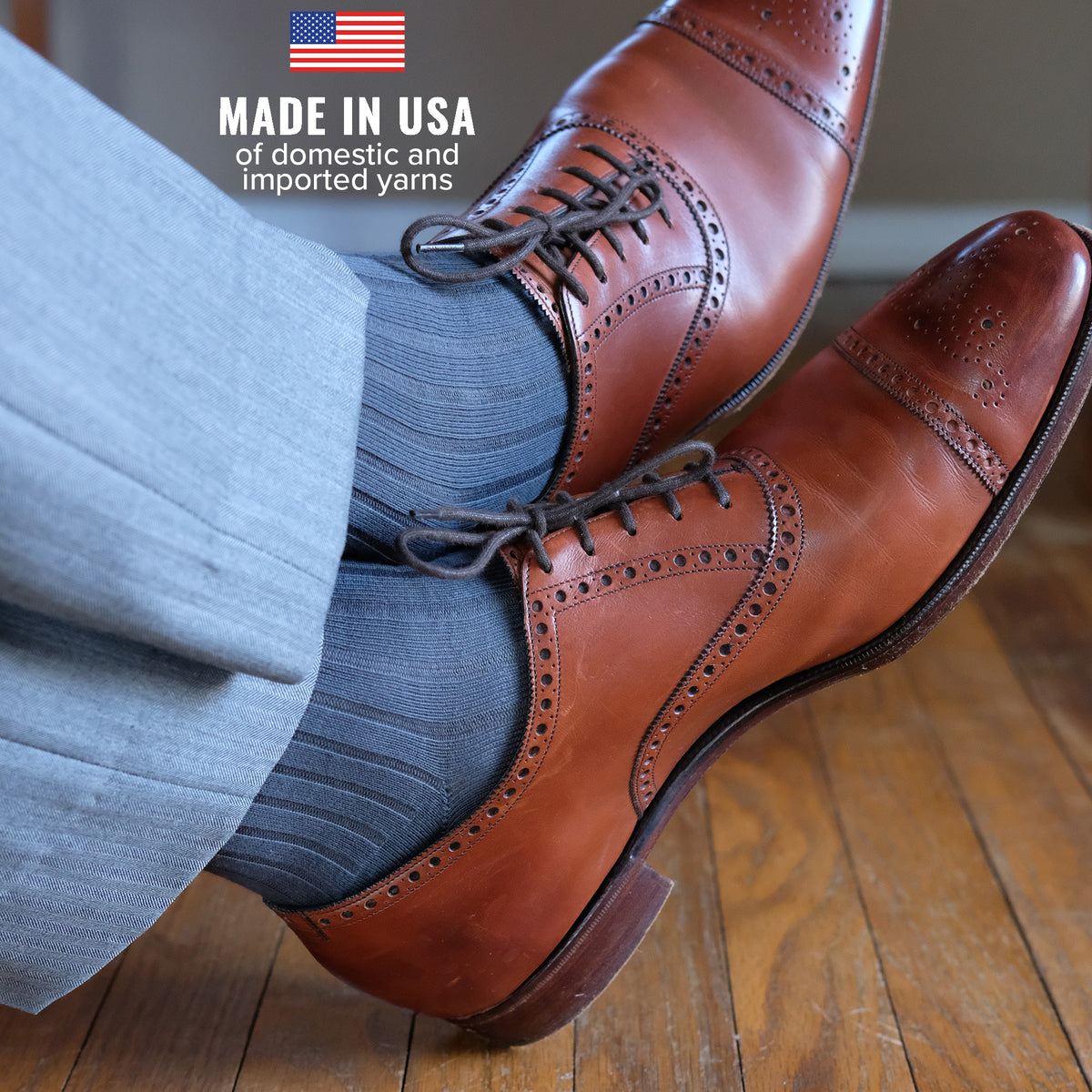 man wearing grey cotton dress socks with grey suit and brown oxfords