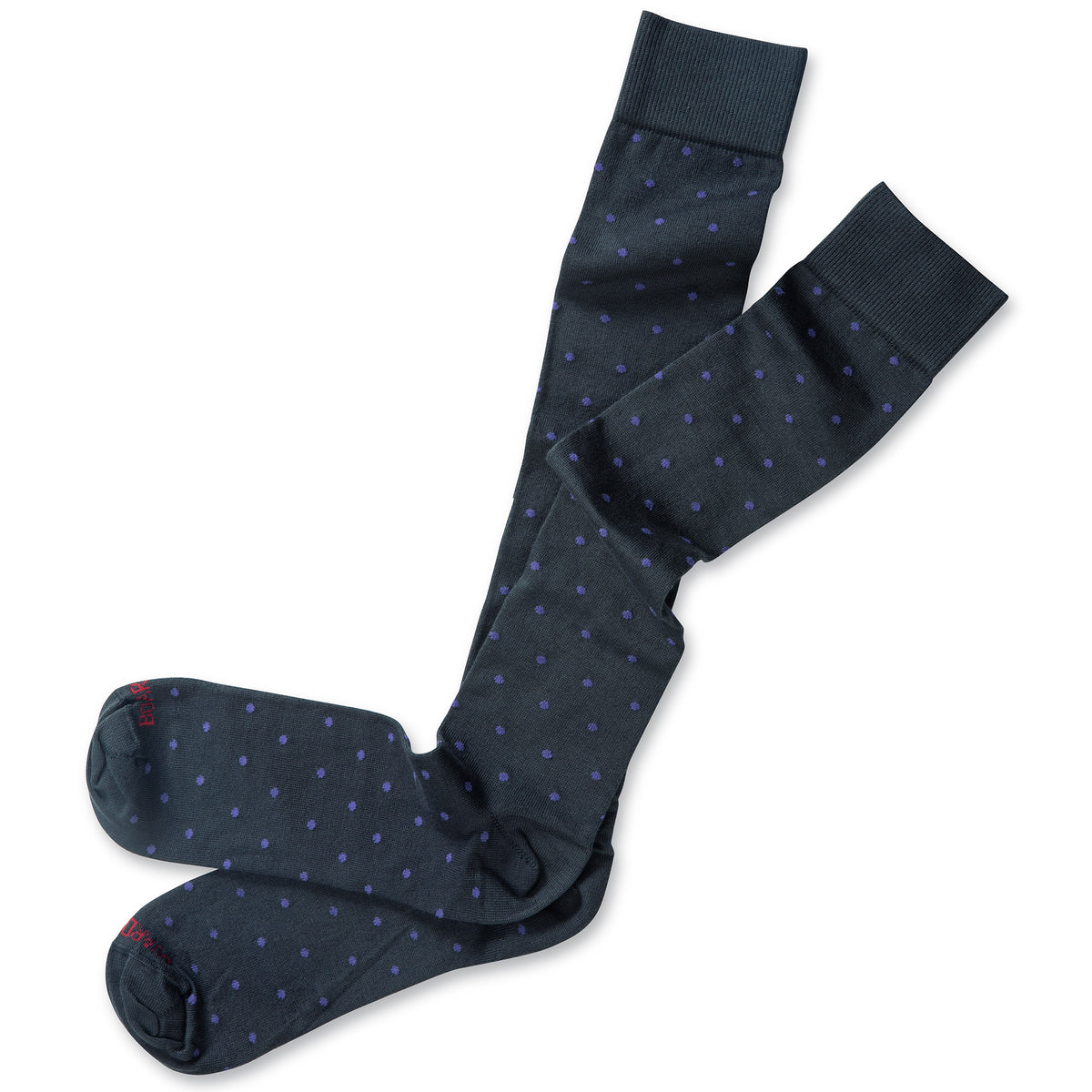 pair of grey cotton over the calf dress socks decorated with purple polka dots atop white table