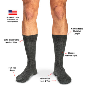 model wearing mid-calf length grey heather dress socks with text overlay detailing features and benefits