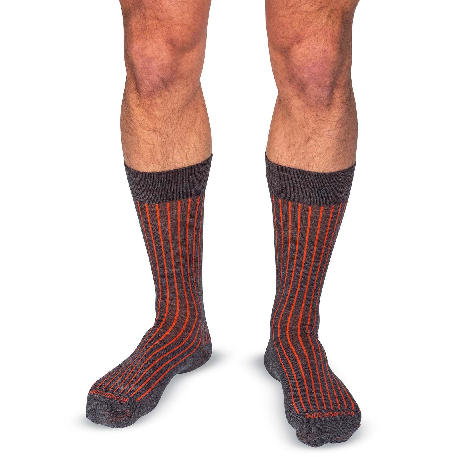model wearing grey and orange mid-calf length shadow stripe dress socks