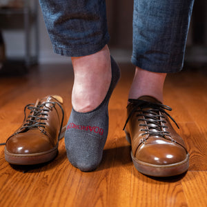 man wearing grey wool no-show socks from Boardroom Socks with brown leather sneakers