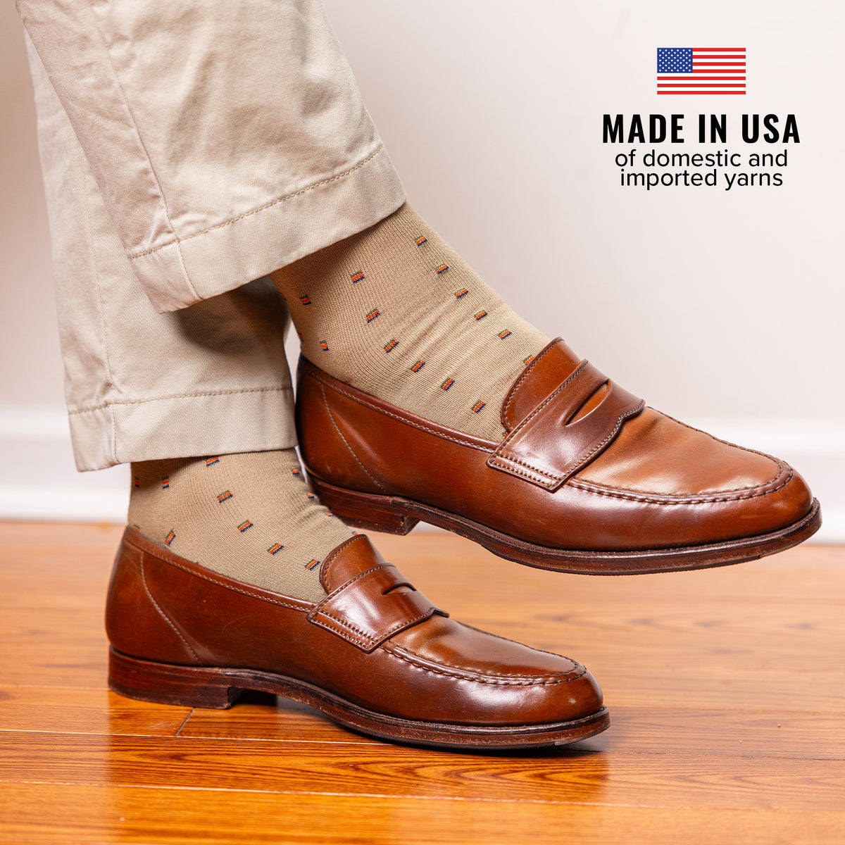 khaki cotton patterned dress socks from Boardroom Socks paired with chinos and brown penny loafers