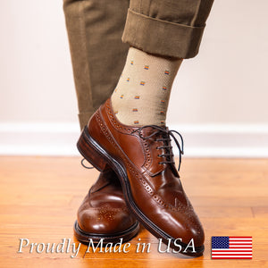 man wearing khaki patterned dress socks with brown slacks and brown wingtips