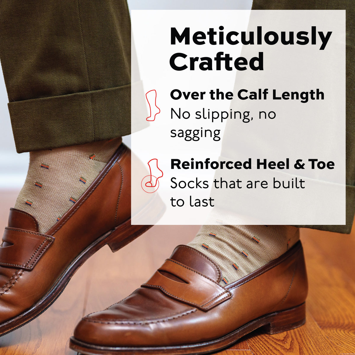 man standing on hardwood floors wearing brown loafers, green pants and Colorful Square Knots on Khaki Merino Wool Over the Calf Dress Socks