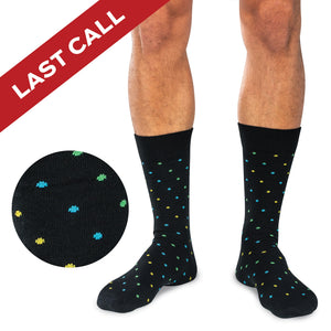 model wearing tri-color dot patterned black socks with last call banner overlay