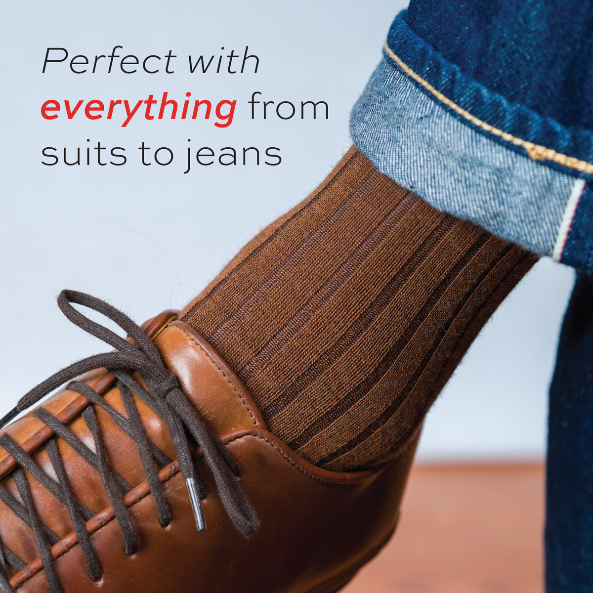 man wearing jeans, casual shoes, and Light Brown Merino Wool Over the Calf Dress Socks