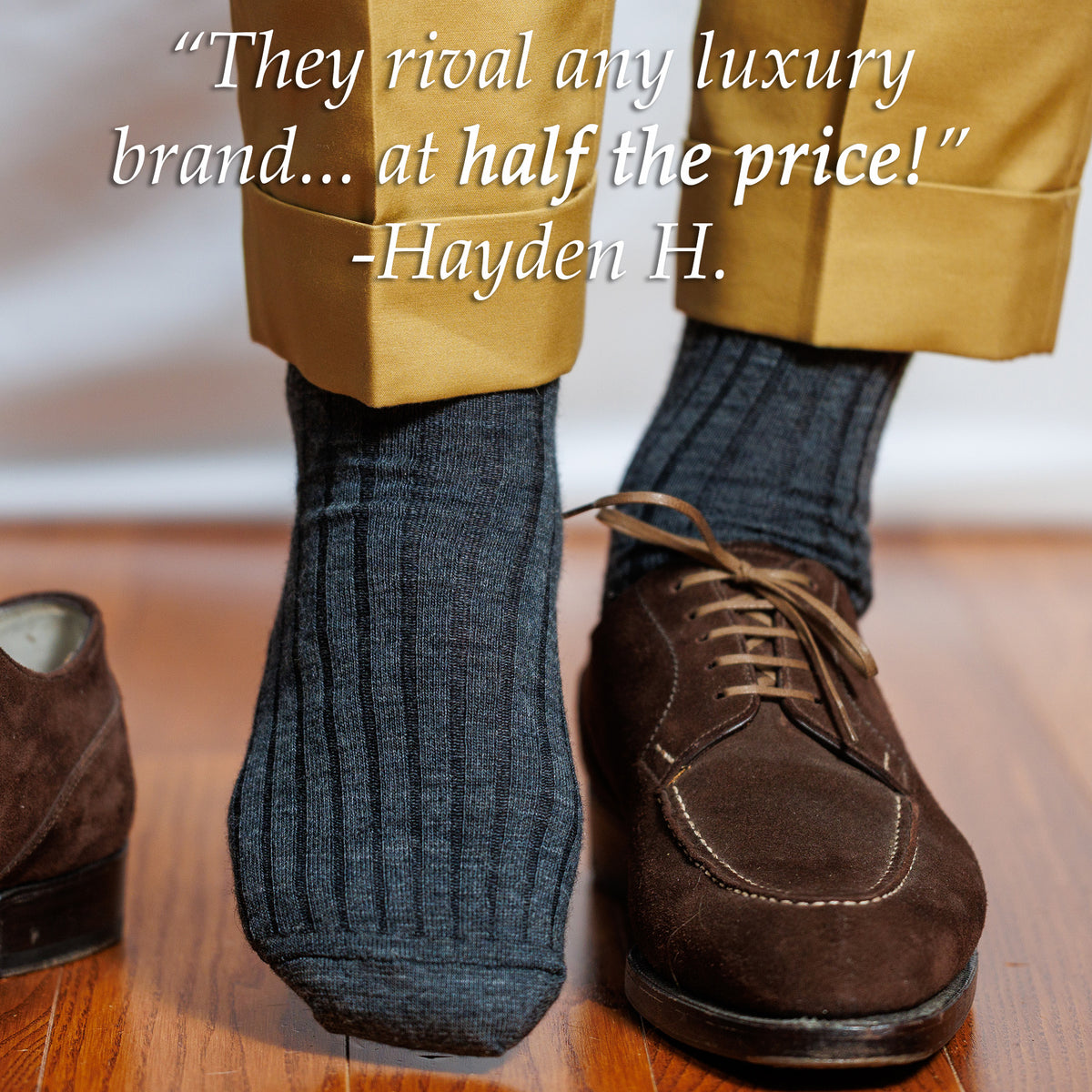 man wearing luxury grey heather merino wool dress socks with gold colored slacks and dark brown suede derbies