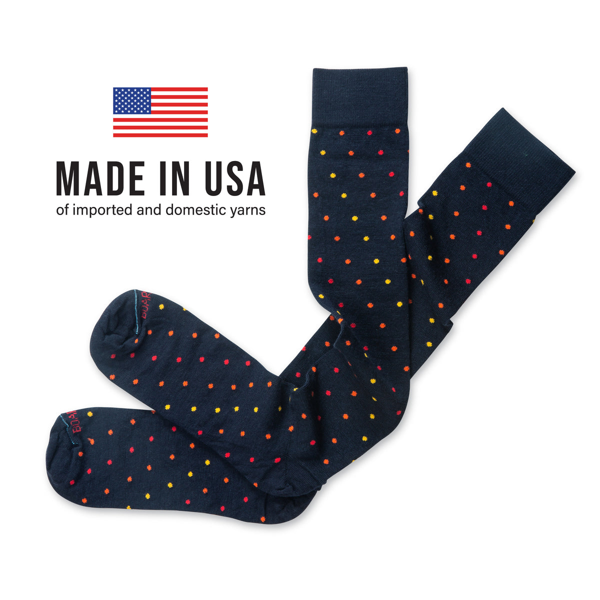 flat lay over the calf wool navy socks with a tri-color dot pattern on white background 