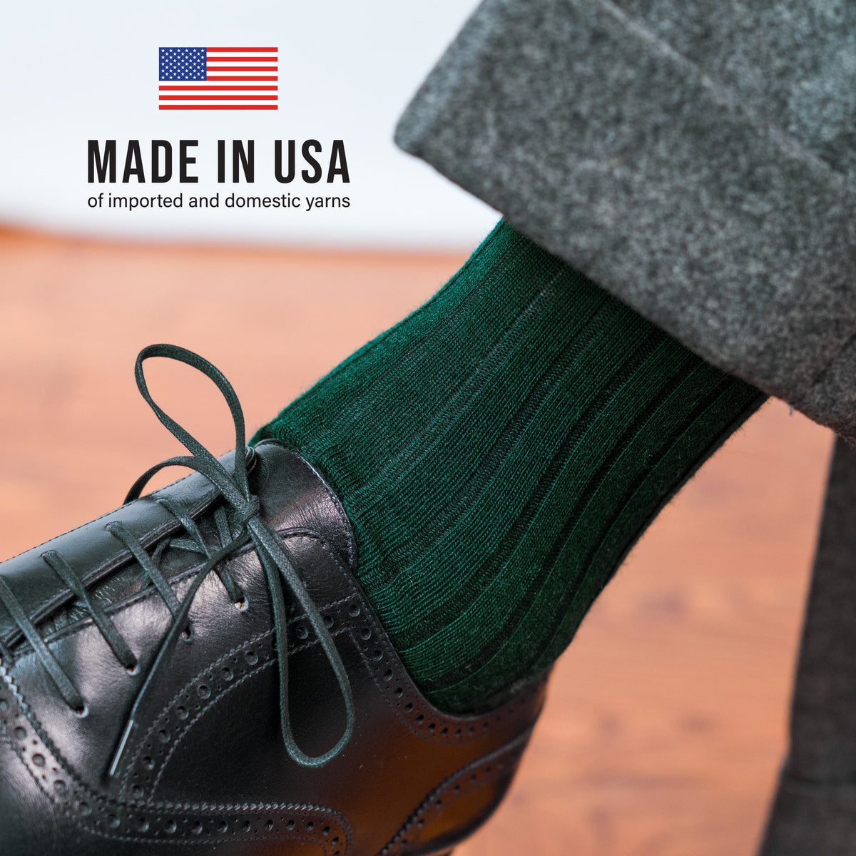 image of person wearing grey pants and Forest Green Merino Wool Over the Calf Dress Socks