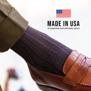 close up of over the calf brown merino wool ribbed dress socks with made in usa text overlay