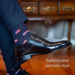 man wearing American flag dress socks with navy suit and black oxfords