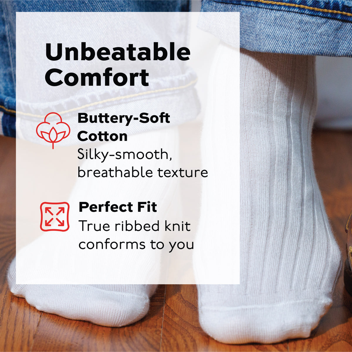 person standing wearing white ribbed merino wool socks and lifting one foot