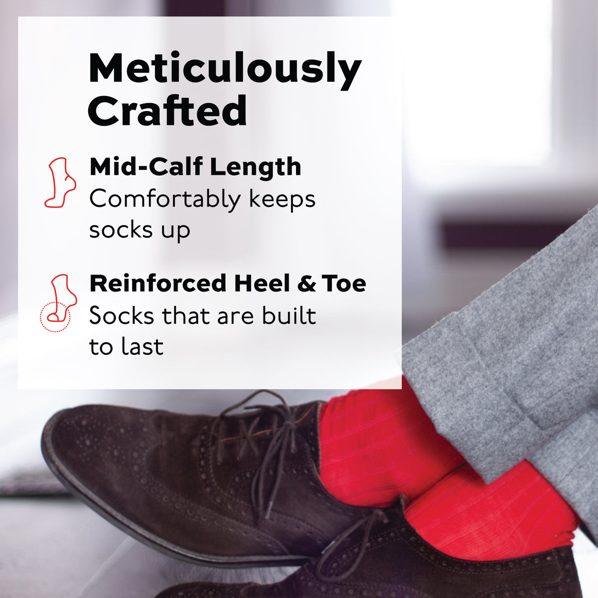 person crossing their legs wearing nice shoes and red merino wool mid calf socks