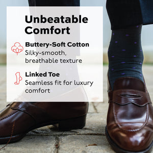 man standing outside wearing mid-calf length grey cotton dress socks with purple polka dots with infographic overlay
