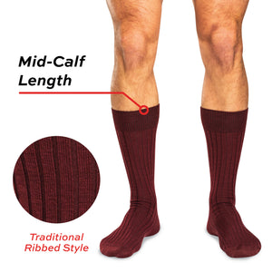 model wearing mid calf burgundy merino wool dress socks with traditional ribbing on a white background