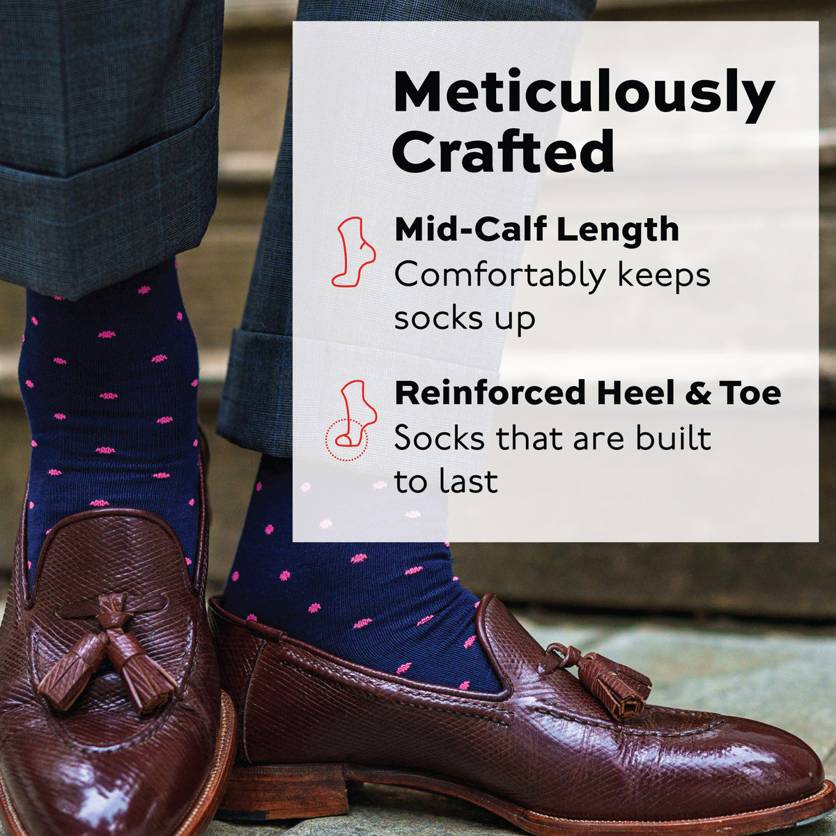 man standing outside wearing navy mid-calf dress socks with bright pink dots with infographic text overlay
