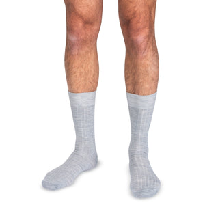 model wearing light grey heather merino wool dress socks