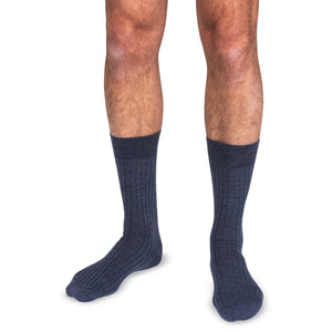 model wearing blue heather merino wool dress socks for men