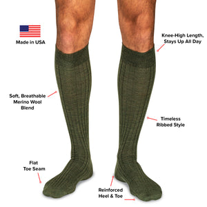 model wearing olive green wool over the calf dress socks