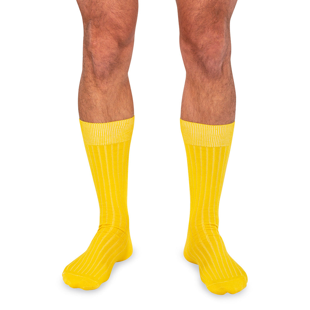 model wearing yellow dress socks