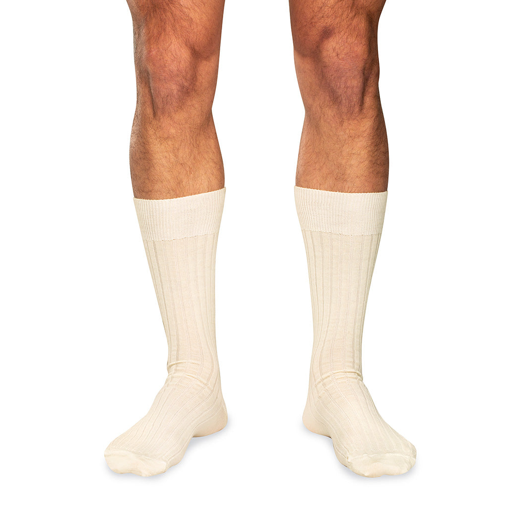 model wearing natural merino wool mid-calf dress socks