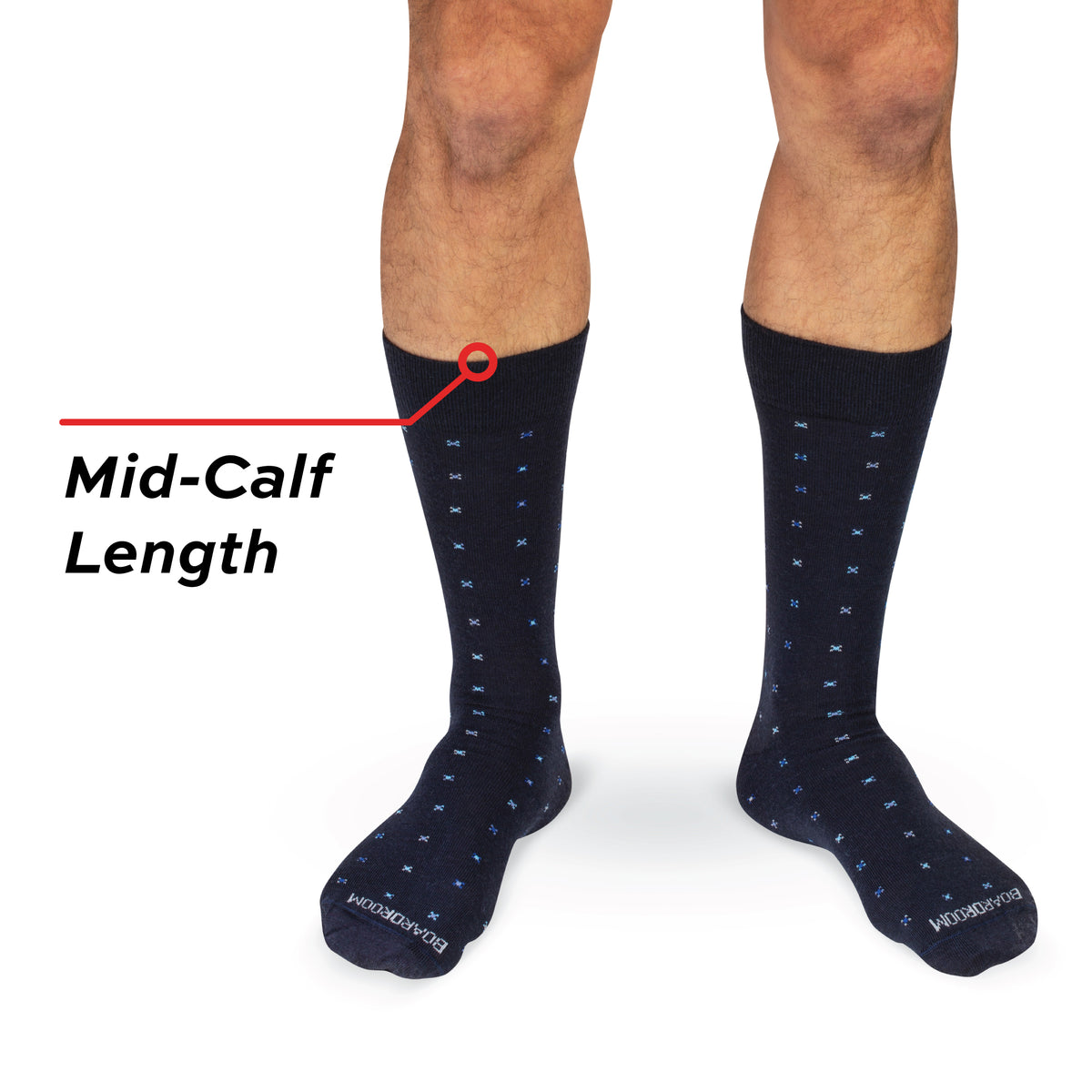 man wearing Navy Geometric Merino Wool Mid-Calf Dress Socks on white background