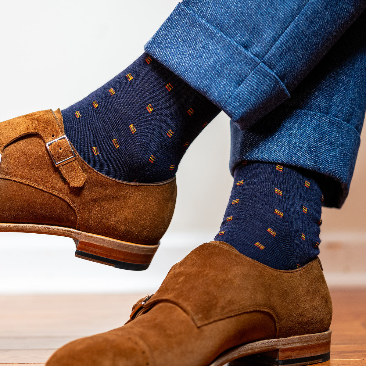brown suede monkstrap dress shoes with blue slacks and navy patterned merino wool dress socks