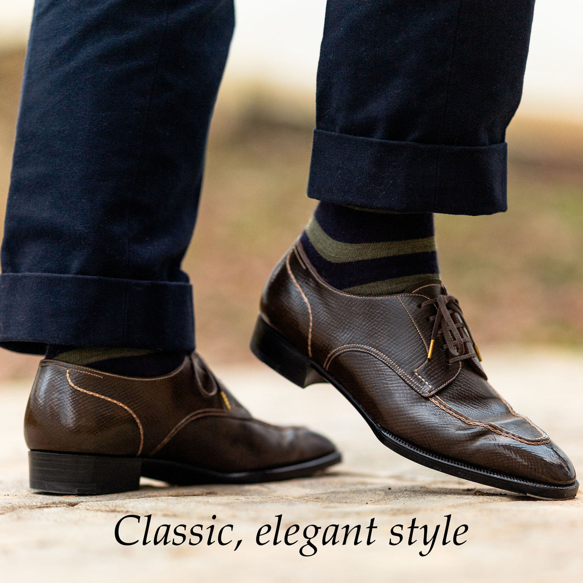 navy-wool-dress-socks-with-thick-olive-stripes-worn-by-man-wearing-navy-slacks-and-brown-dress-shoes