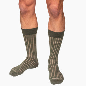 model wearing olive and tan shadow stripe dress socks