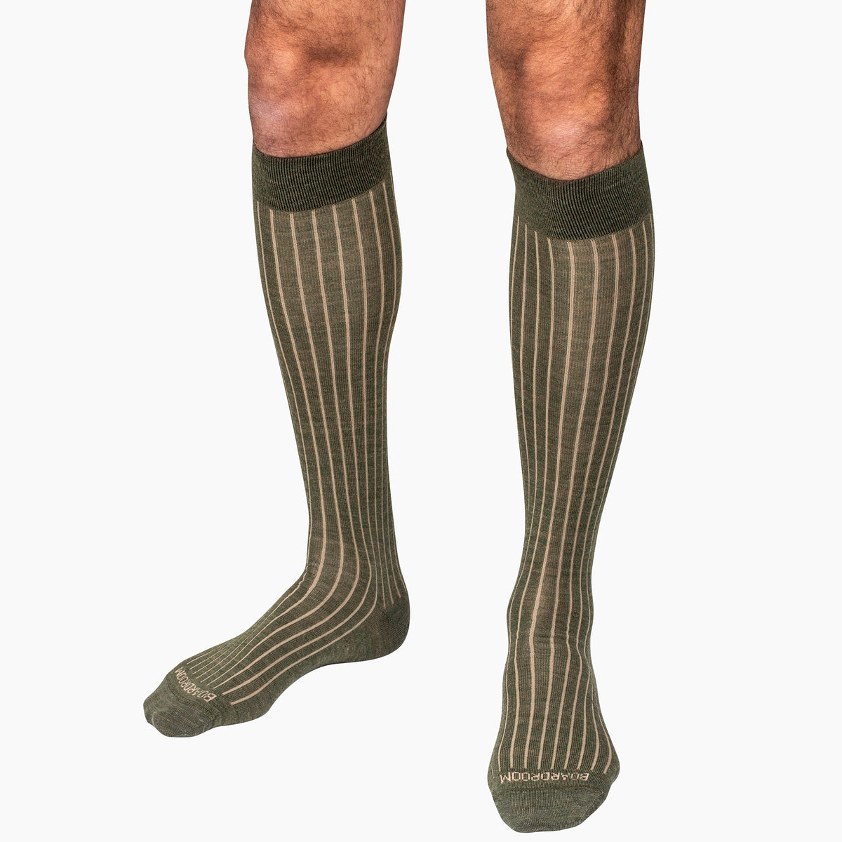 olive and tan shadow stripe over the calf dress socks worn by model
