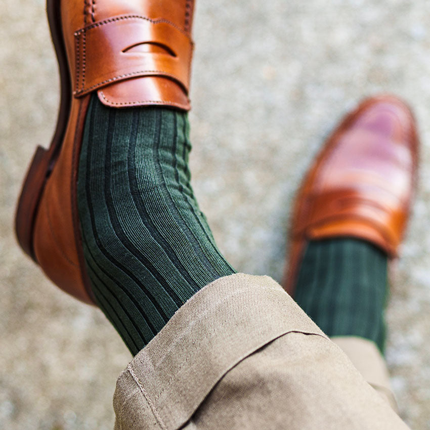 olive green cotton dress socks with khakis and light brown penny loafers