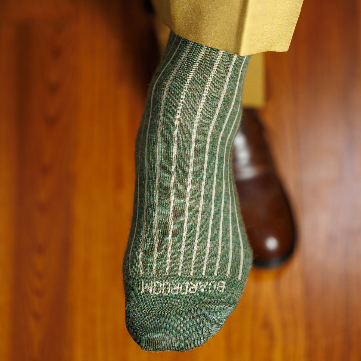 olive merino wool shadow stripe dress socks worn with tan slacks and brown dress shoes