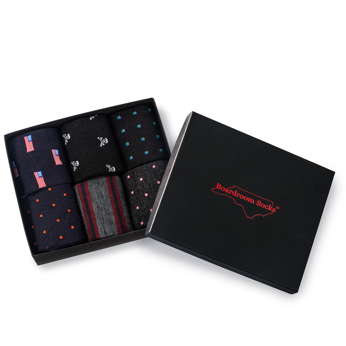 opened gift box filled with six different styles of patterned merino wool over the calf dress socks from Boardroom Socks