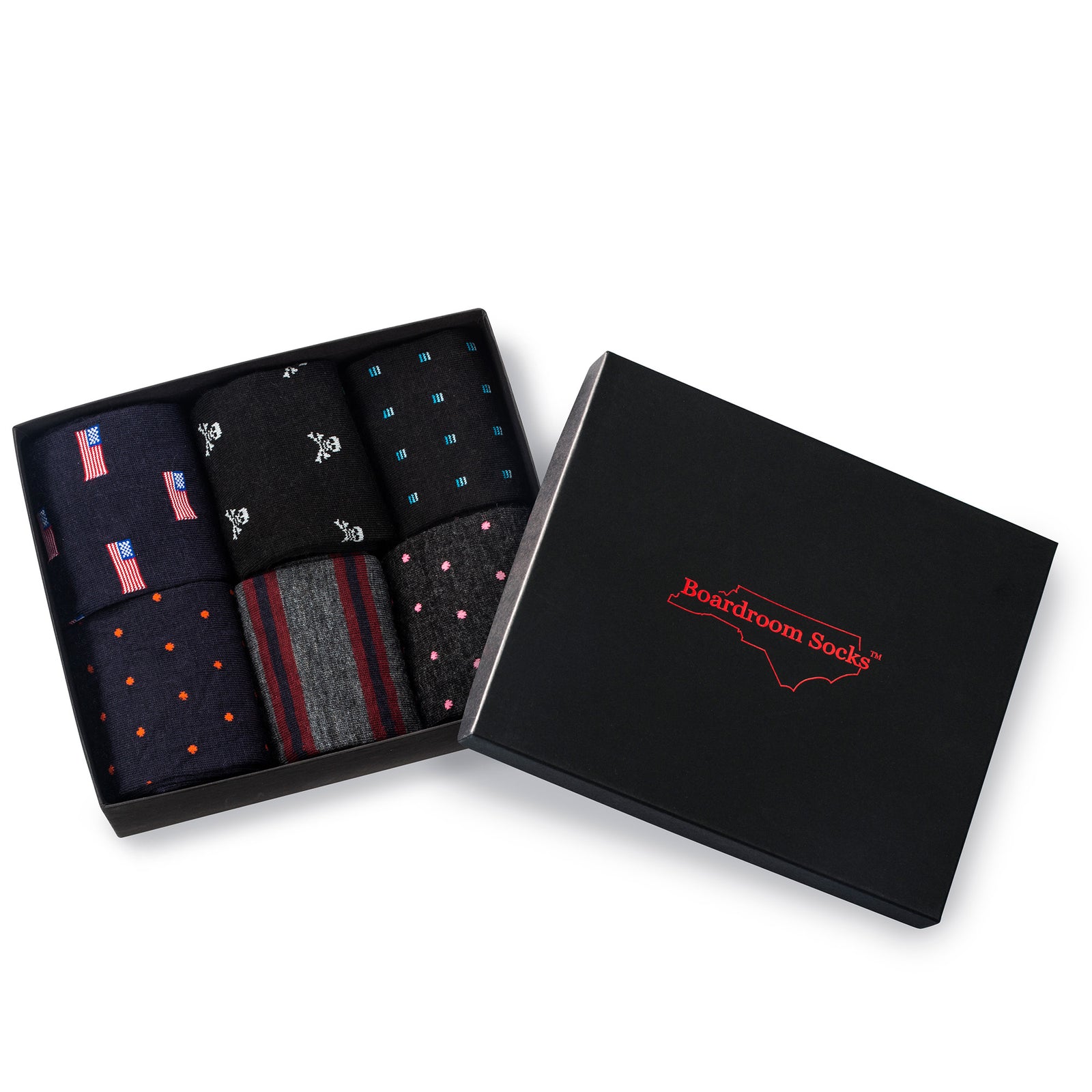 opened gift box filled with six different styles of patterned merino wool over the calf dress socks from Boardroom Socks