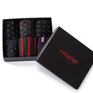 opened Boardroom Socks gift box filled with six pairs of colorful merino wool dress socks