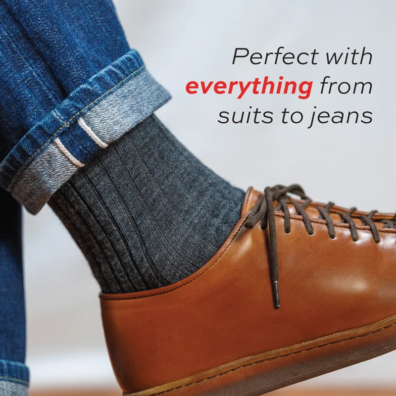 close up image of a man wearing jeans and grey Merino Wool Mid-Calf Dress Socks