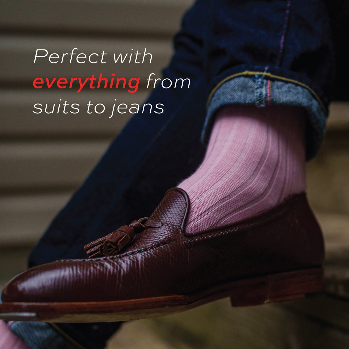 pink merino wool dress socks worn on man with text overlay