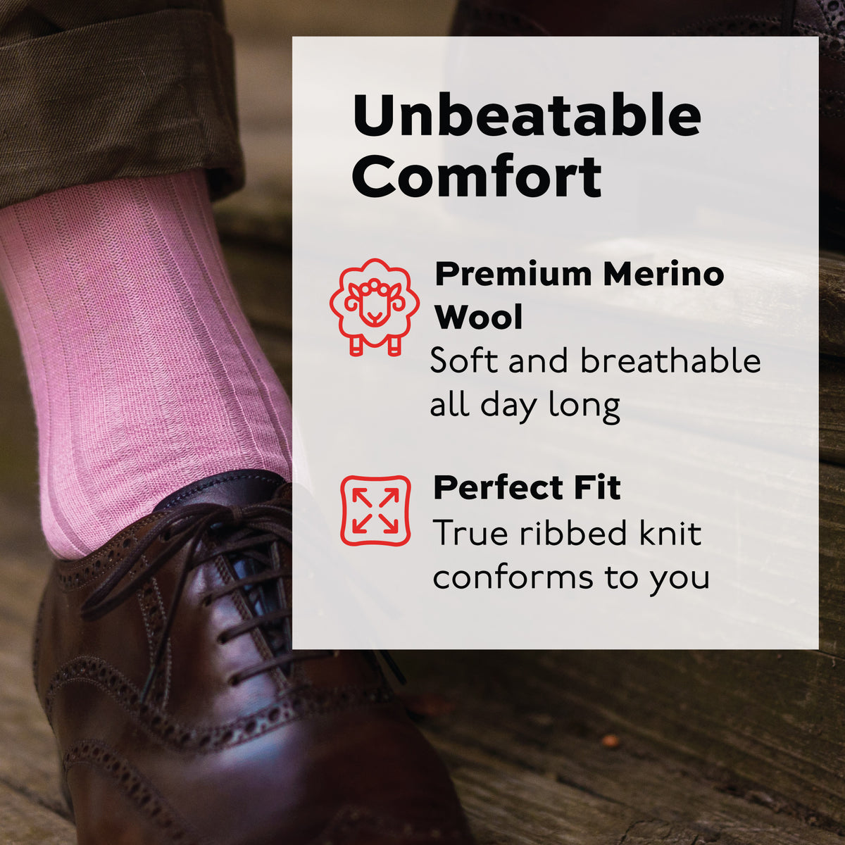 close up image of pink merino wool dress socks worn with brown pants and shoes