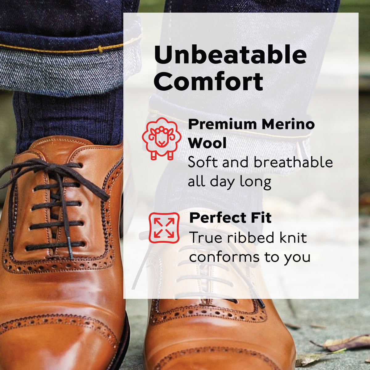 person wearing brown dress shoes and navy merino wool dress socks with jean pants