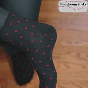 video overviewing black cotton dress socks decorated with small red polka dots